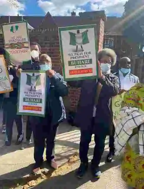 Buhari Supporters Spotted With Placards, Hold Prayers At Nigeria House, London (Photos)