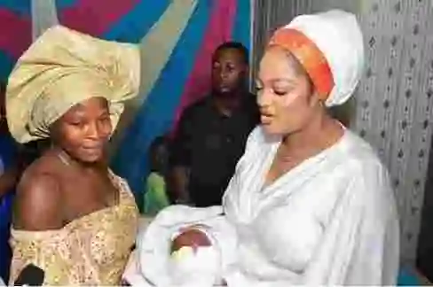 Ooni Of Ife's Wife Attends Christening Of Released #EndSARS Protester’s Son