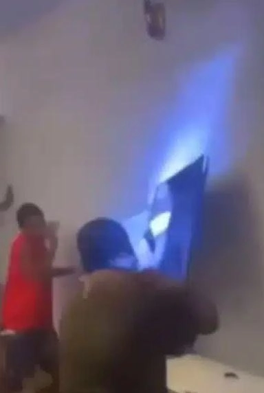 Drama As Angry Fans Destroy Television Over Nigeria’s Tragic AFCON Loss