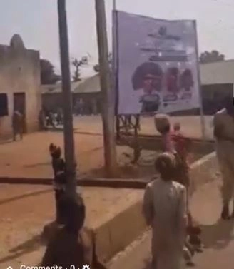 The Moment Some Kids Destroyed And Burnt Billboard With President Buhari And Governor Nasir El-Rufai’s Photo (Video)